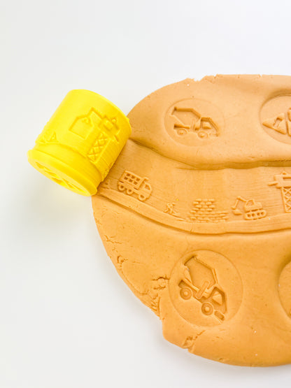Yellow Construction Eco Playdough roller with orange sensory dough. Play tools and accessory