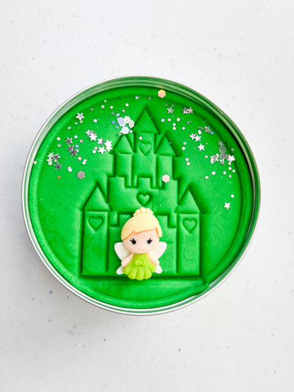Tin of green playdough imprinted with castle and princess figure for princess themed kids birthday party favours. Eco friendly and plastic free alternative party bag fillers