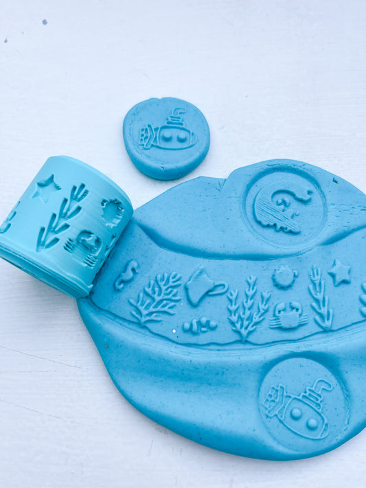 Blue under the sea Eco Playdough roller with blue sensory dough. Play tools and accessory creating under the sea play scenes.