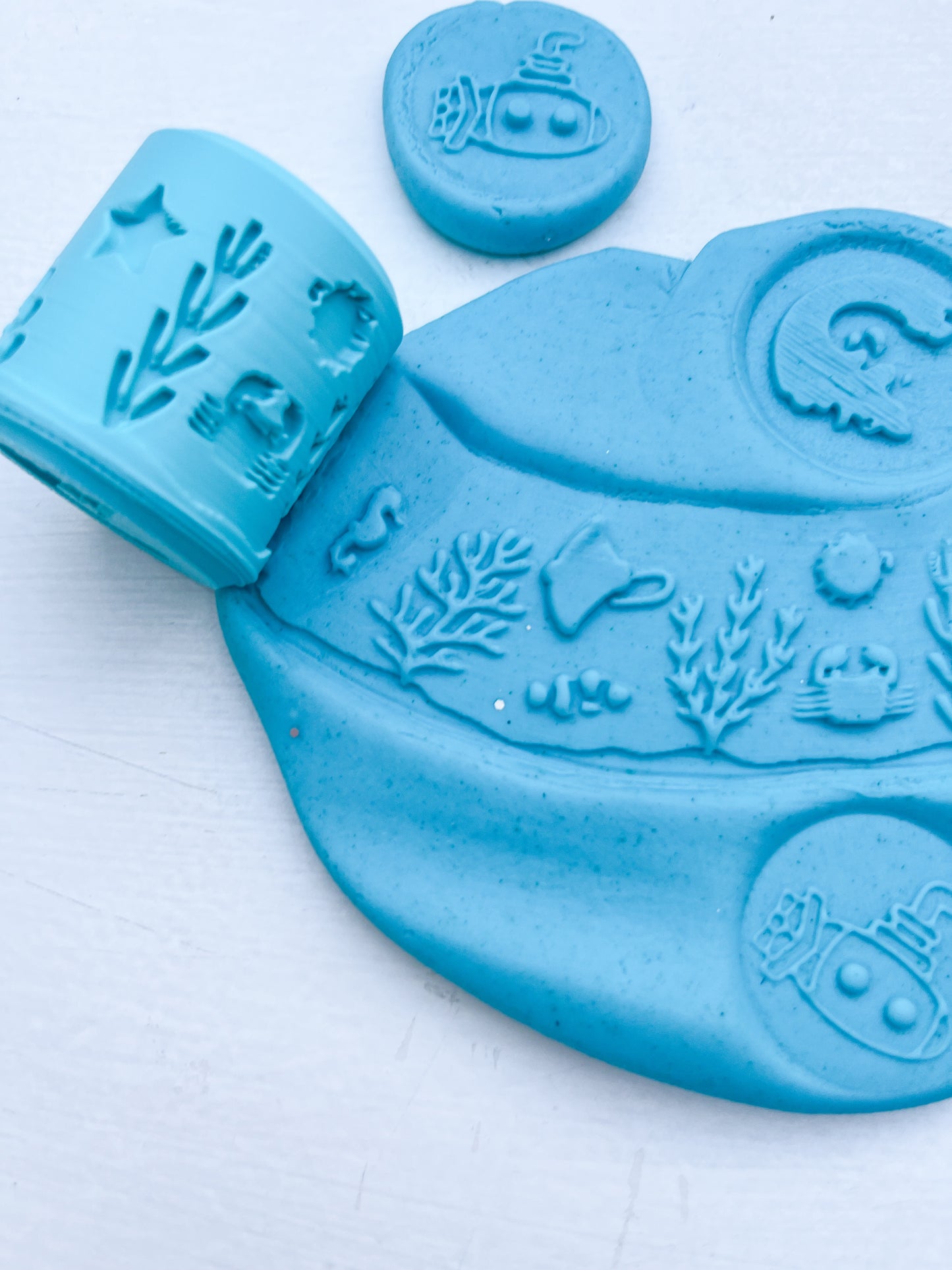 Blue under the sea Eco Playdough roller with blue sensory dough. Play tools and accessory creating under the sea play scenes.