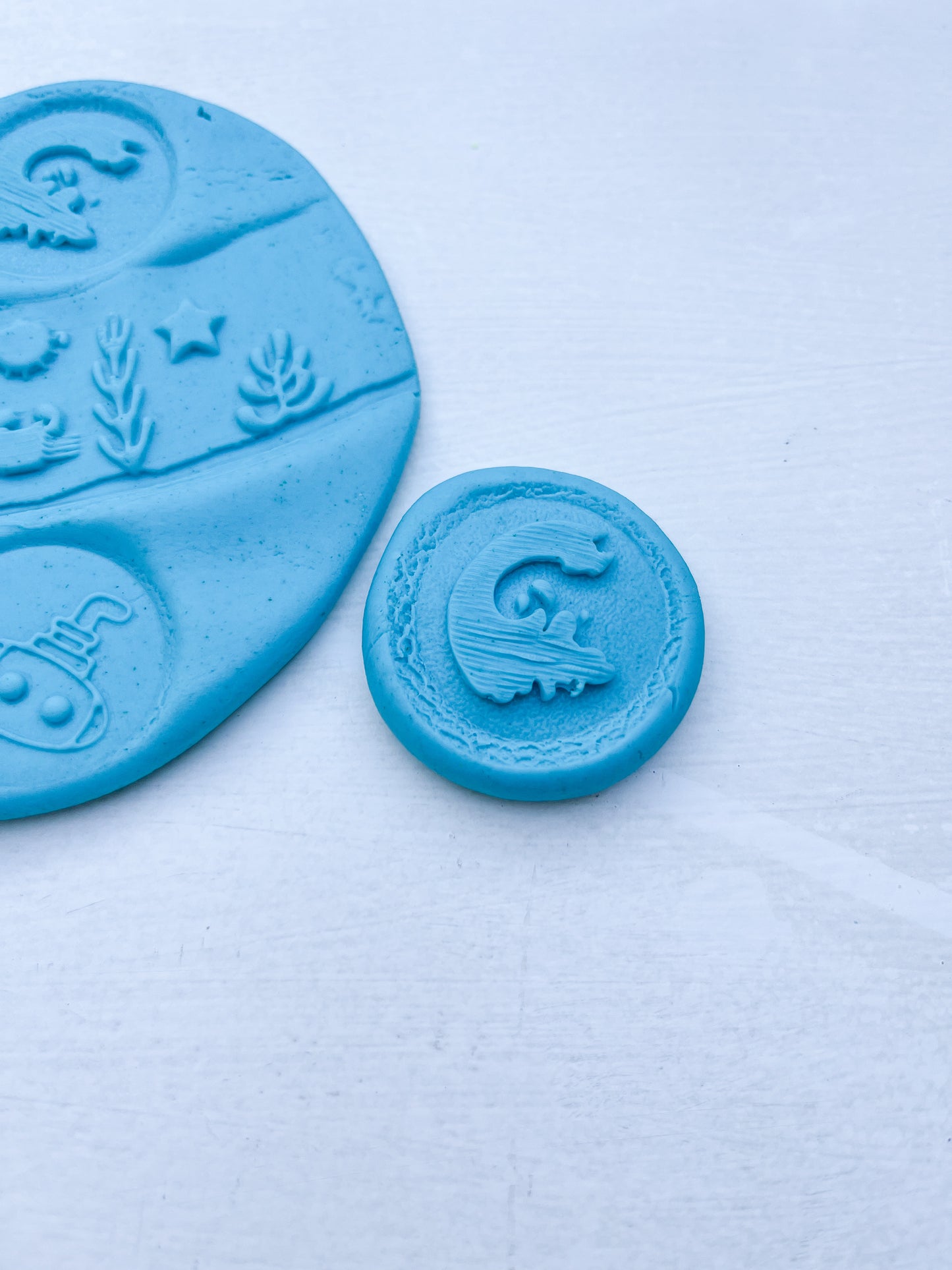Blue under the sea Eco Playdough roller with blue sensory dough. Play tools and accessory creating under the sea play scenes. Zoomed in